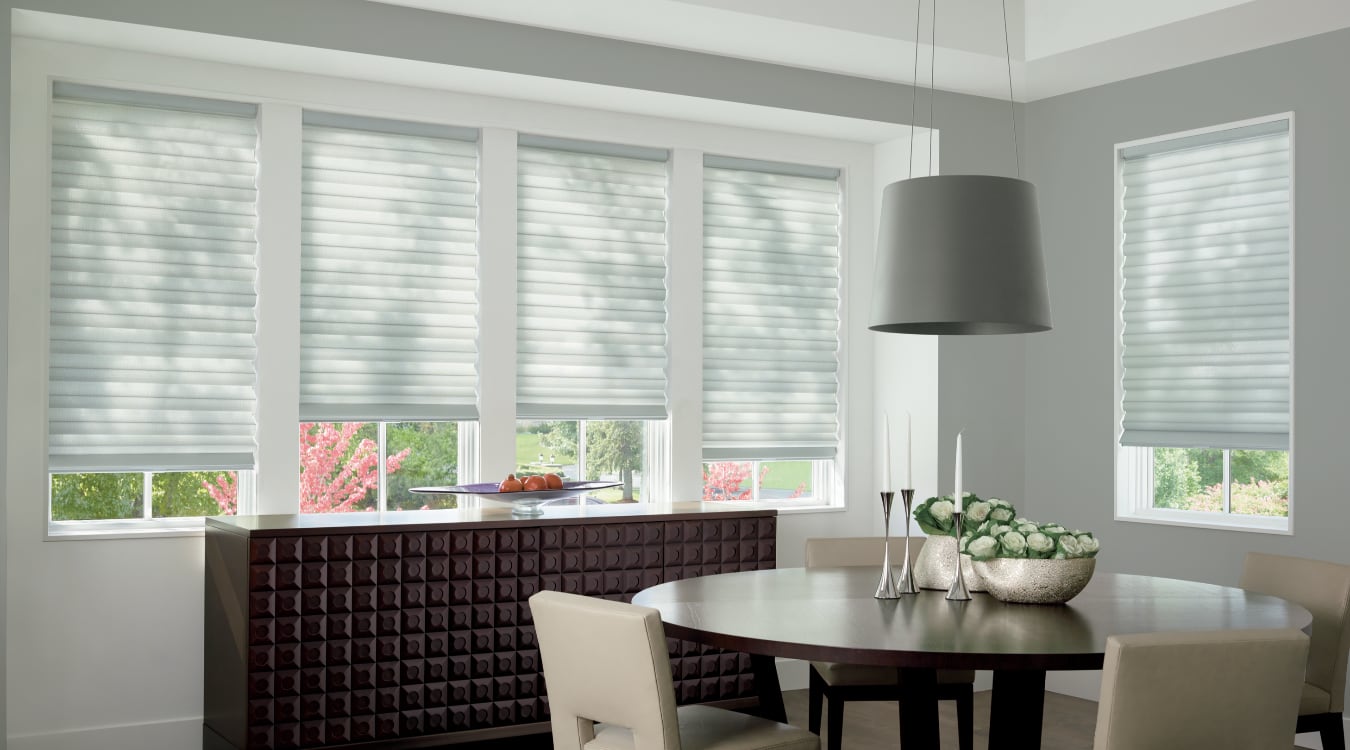 Cordless motorized shades in a Houston dining room